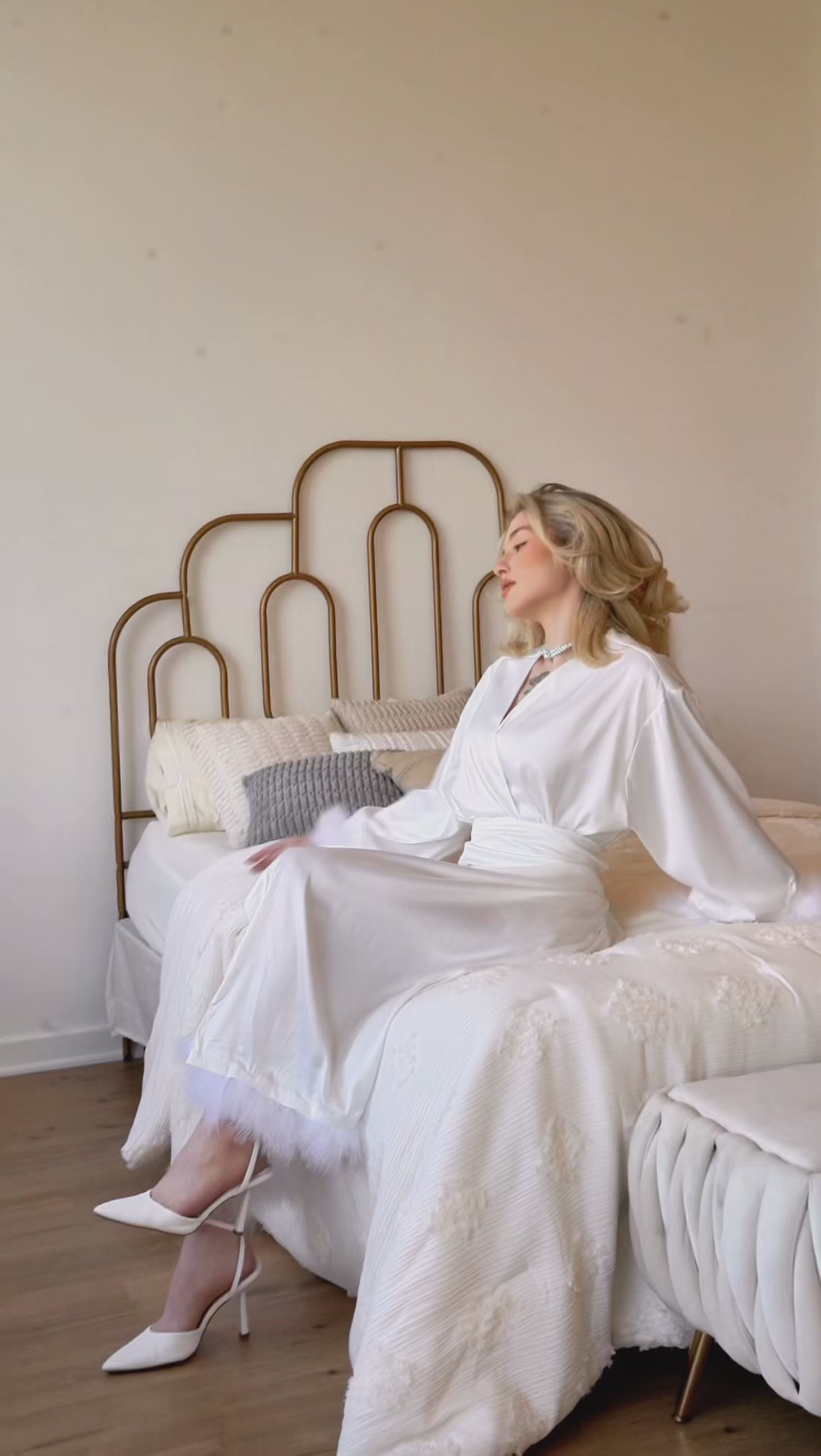 woman in silk robe video bridal makeup bouqet morning of a broide